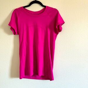 Lululemon. Bright pink. Swiftly short sleeve. Size 12